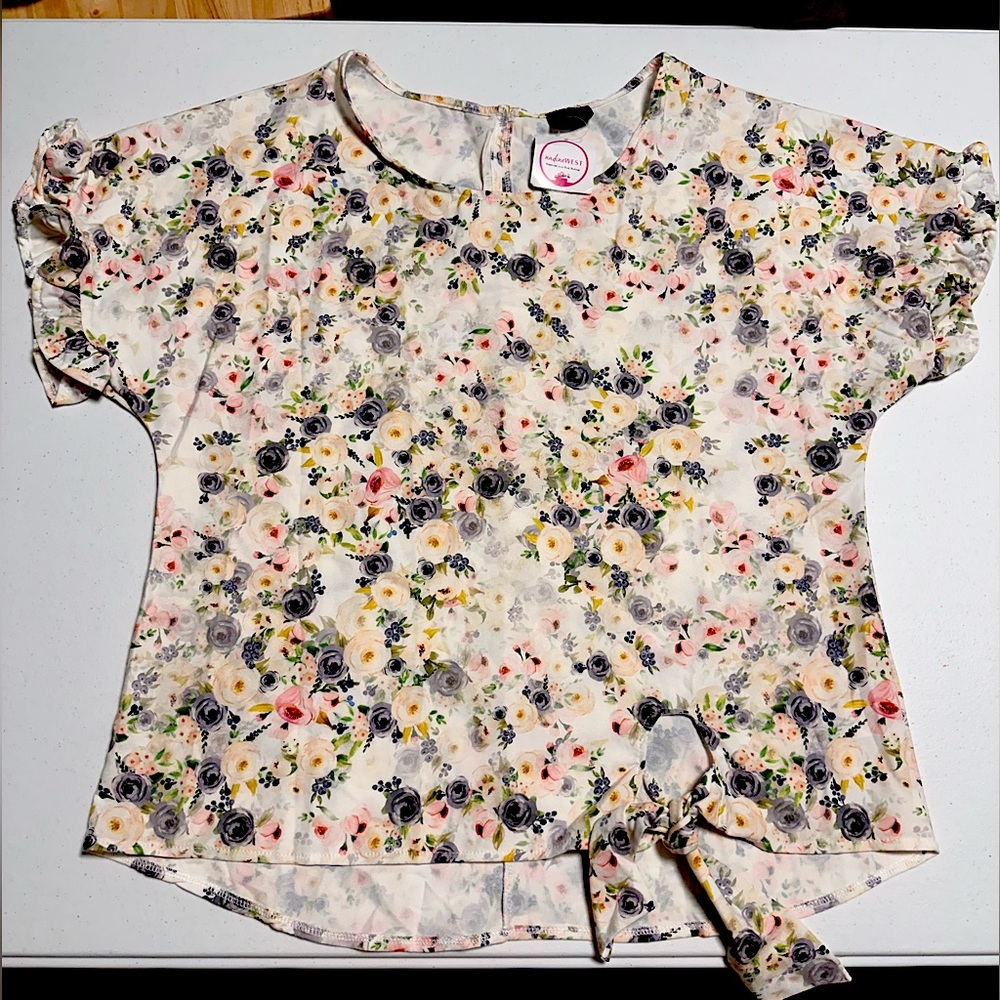 Never worn girly top. Still has tags. - Picture 1 of 1